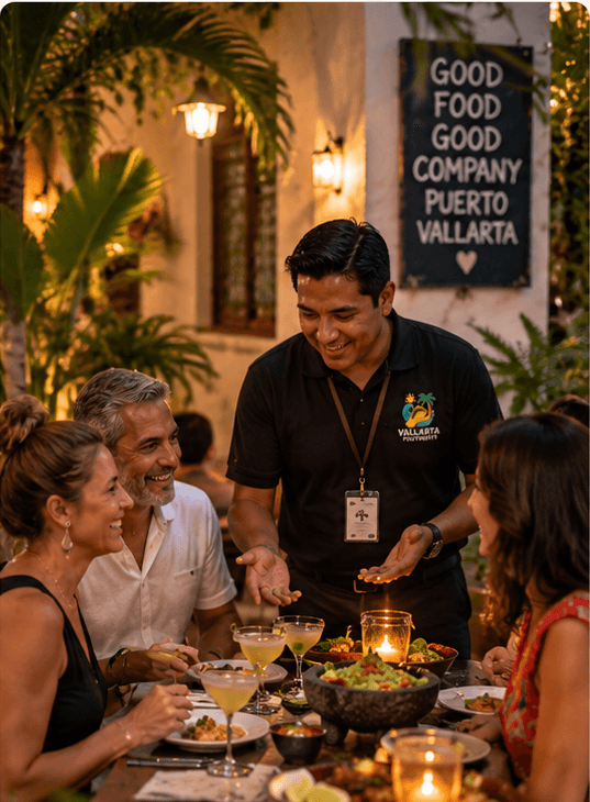 A private group enjoying a candlelit dinner with a Vallarta Footprints guide in a lush garden restaurant setting in Puerto Vallarta